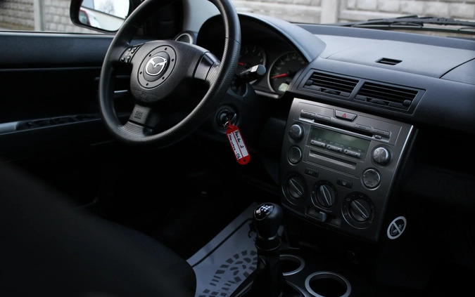 Mazda 2 cena 9900 przebieg: 180000, rok produkcji 2006 z Solec Kujawski małe 154